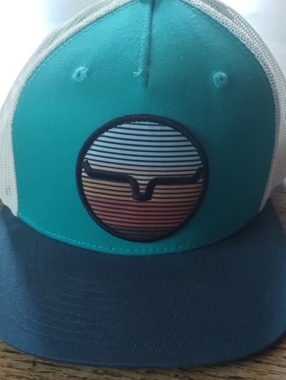 Kimes Ranch Teal and Navy Mesh-Back Trucker Hat with Sunset Patch